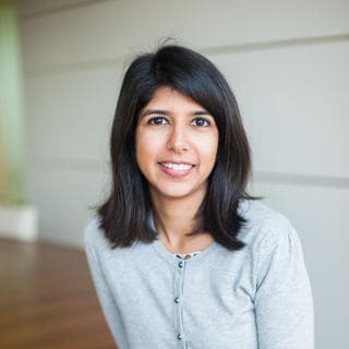 Ashden team member, Chhavi Sharma smiling at the camera